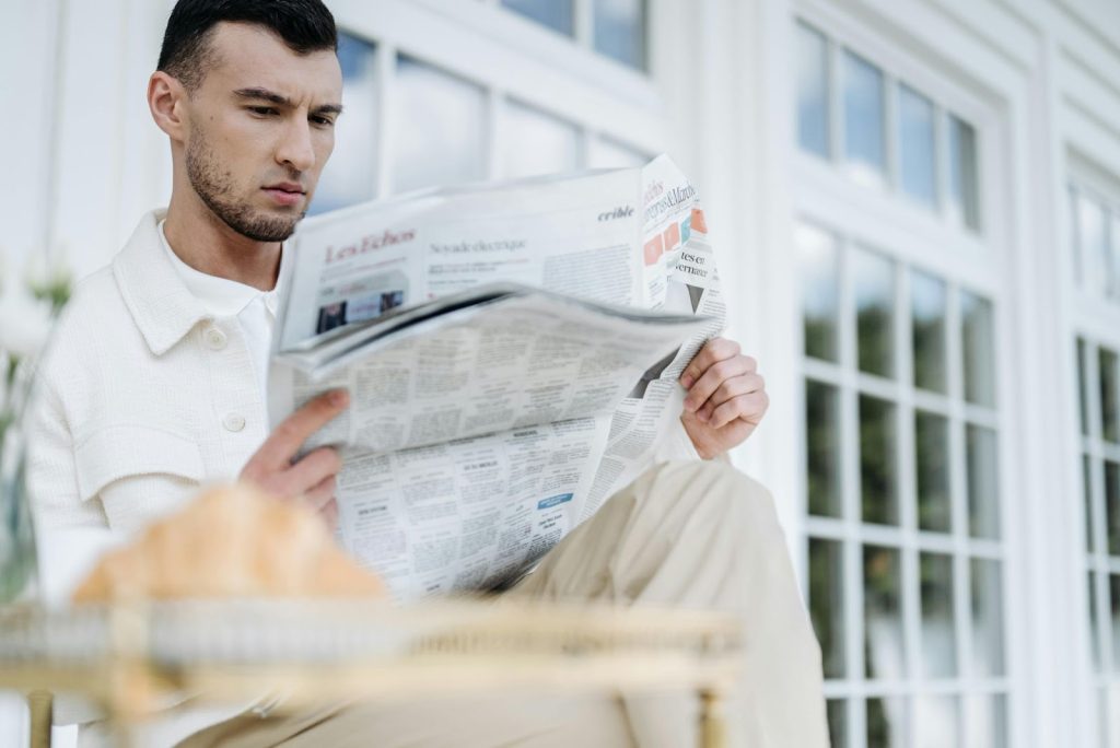 Man reading newspaper